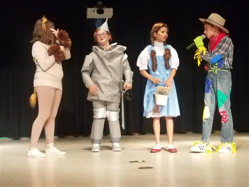 students performing the Wizard of Oz play